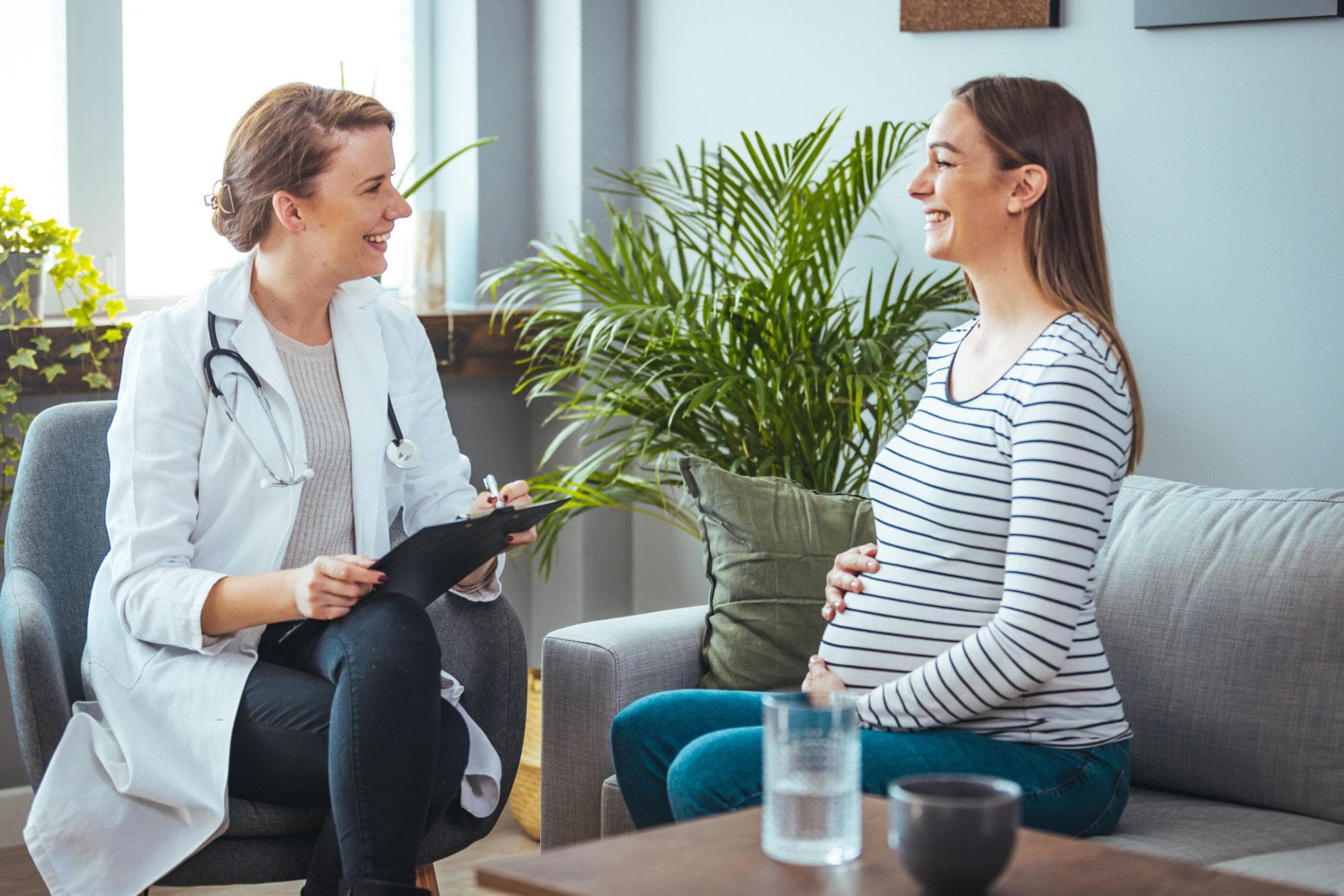 Doctor providing professional maternity care to a patient